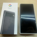 1561824-1 Mobiltelefon Google Pixel 6 med hörlurar