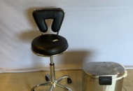 1549049 Rollaway stool with backrest and waste container