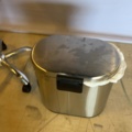 1549049-3 Rollaway stool with backrest and waste container