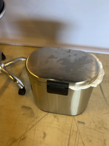 1549049-3 Rollaway stool with backrest and waste container