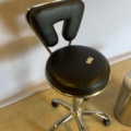 1549049-6 Rollaway stool with backrest and waste container