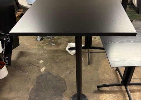 2 tables with black tabletop and column base