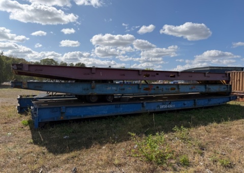 Lot of terminal trolleys and roll-off trucks