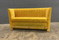 1570392 Yellow velvet sofa with an integrated brass-colored footrest at the bottom