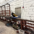 1546134-1 Metal cutting with rack and roller conveyor