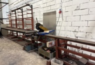 1546134 Metal cutting with rack and roller conveyor