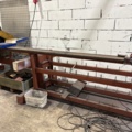 1546134-5 Metal cutting with rack and roller conveyor