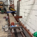 1546134-6 Metal cutting with rack and roller conveyor