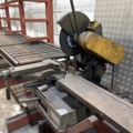 1546134-14 Metal cutting with rack and roller conveyor