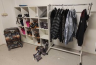 1485693 Collection of clothes, boots, suitcase, etc.