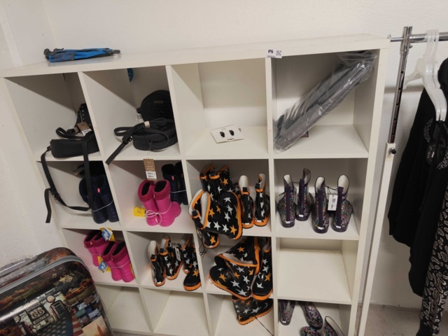 1485693-2 Collection of clothes, boots, suitcase, etc.