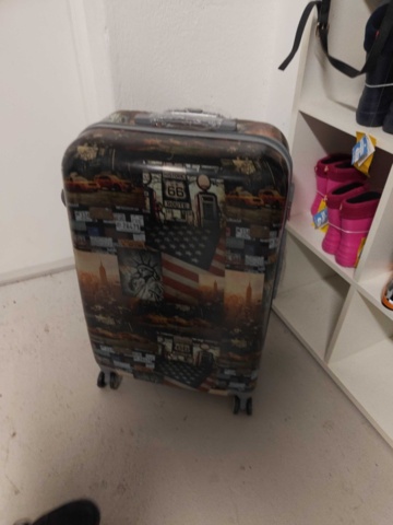 1485693-7 Collection of clothes, boots, suitcase, etc.