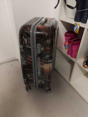 1485693-8 Collection of clothes, boots, suitcase, etc.