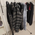 1485693-10 Collection of clothes, boots, suitcase, etc.