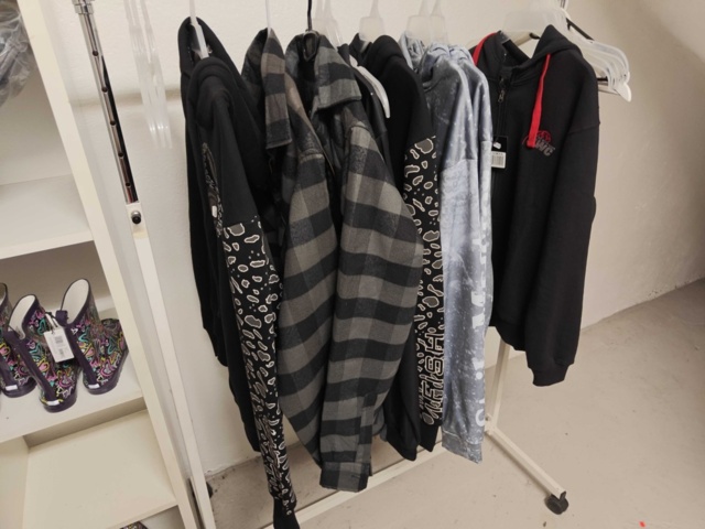 1485693-10 Collection of clothes, boots, suitcase, etc.