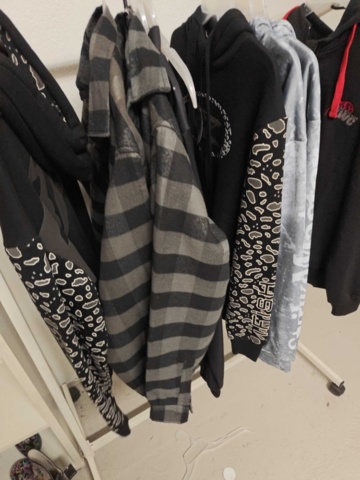 1485693-11 Collection of clothes, boots, suitcase, etc.