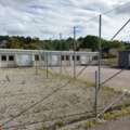 1565964-1 Football field and basketball court with fence