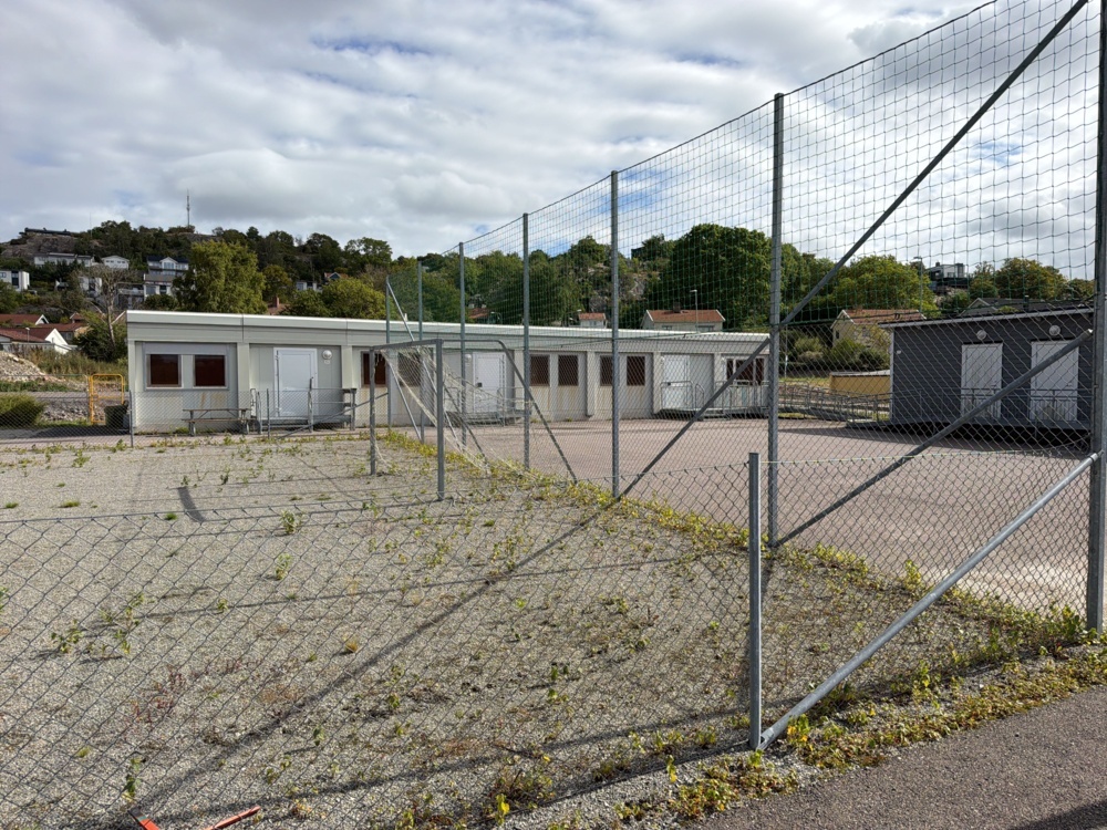 1565964-1 Football field and basketball court with fence
