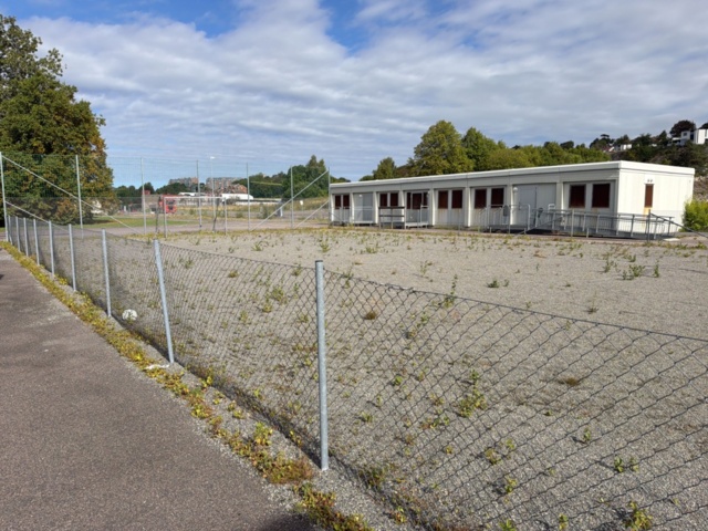1565964-3 Football field and basketball court with fence