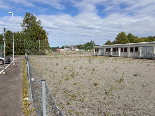 1565964-4 Football field and basketball court with fence