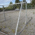 1565964-5 Football field and basketball court with fence
