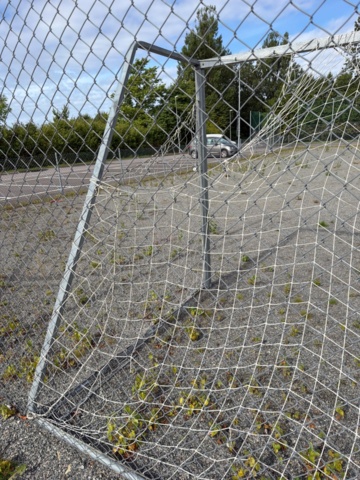 1565964-7 Football field and basketball court with fence