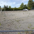 1565964-8 Football field and basketball court with fence