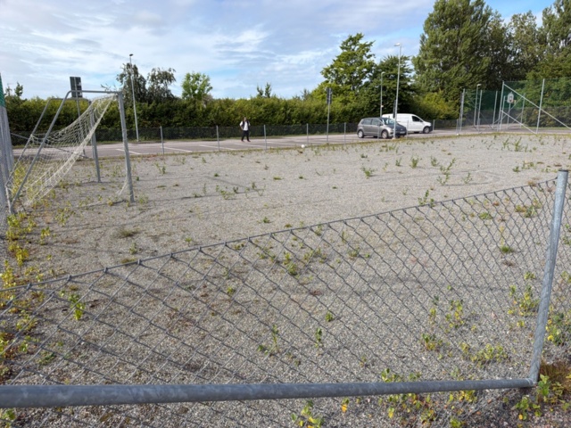 1565964-8 Football field and basketball court with fence