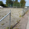1565964-9 Football field and basketball court with fence