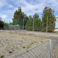 1565964-10 Football field and basketball court with fence