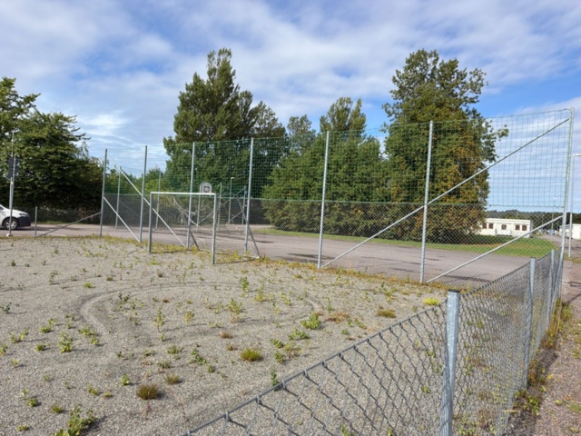 1565964-10 Football field and basketball court with fence
