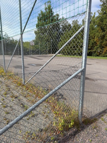 1565964-11 Football field and basketball court with fence