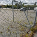 1565964-12 Football field and basketball court with fence