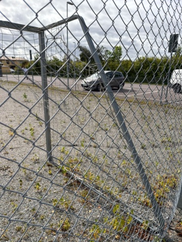 1565964-14 Football field and basketball court with fence
