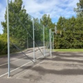 1565964-16 Football field and basketball court with fence