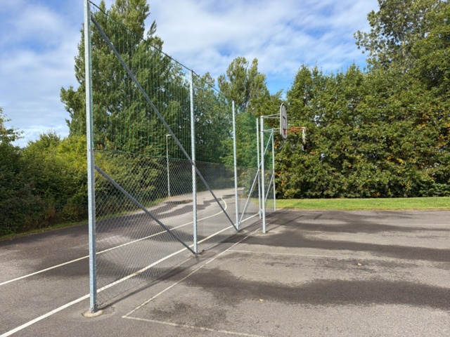 1565964-16 Football field and basketball court with fence