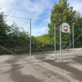 1565964-17 Football field and basketball court with fence