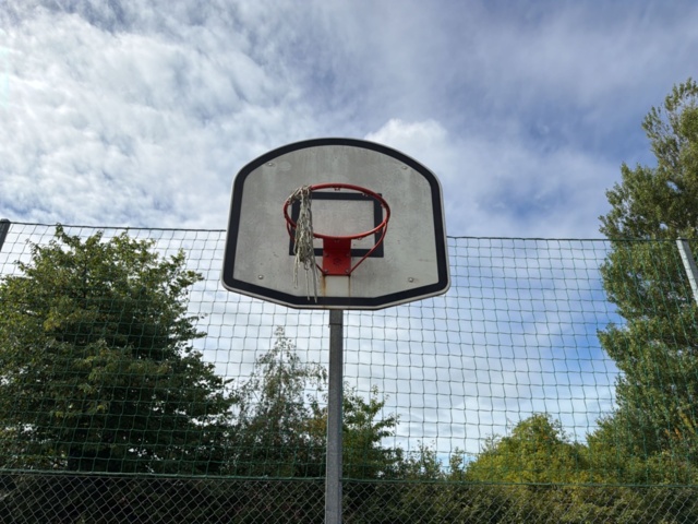 1565964-19 Football field and basketball court with fence