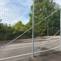 1565964-21 Football field and basketball court with fence