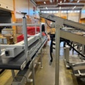 1573143-16 Packing machine with sorting system and roller conveyors - Emotions PSF3500