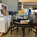 1573143-17 Packing machine with sorting system and roller conveyors - Emotions PSF3500