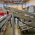 1573143-24 Packing machine with sorting system and roller conveyors - Emotions PSF3500