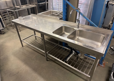 Stainless steel sink with two bowls and mixer tap