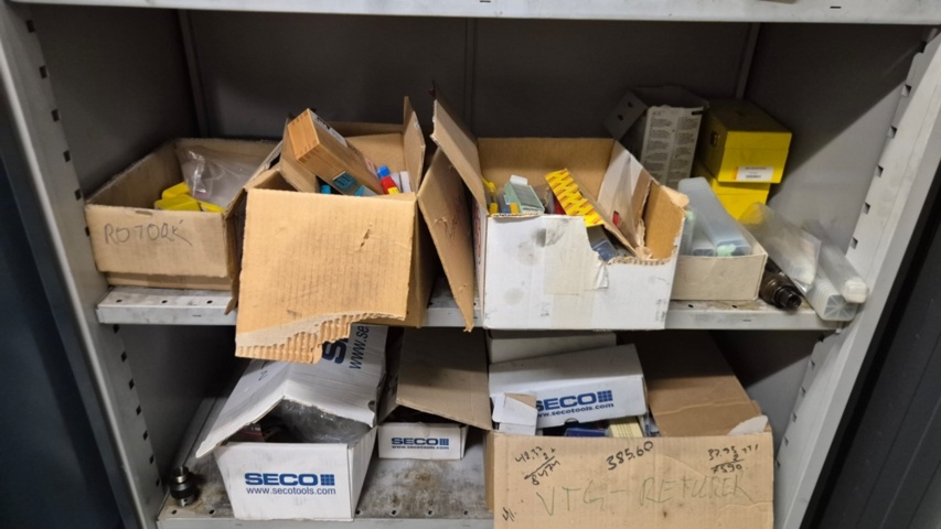 1571396-9 Sheet metal cabinet containing various drill and milling tools