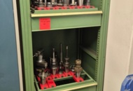 1571395 Sheet metal cabinet with drawers and processing tools