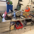 1566890-1 Collection of tools and workshop machines on workbench