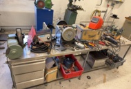 1566890 Collection of tools and workshop machines on workbench