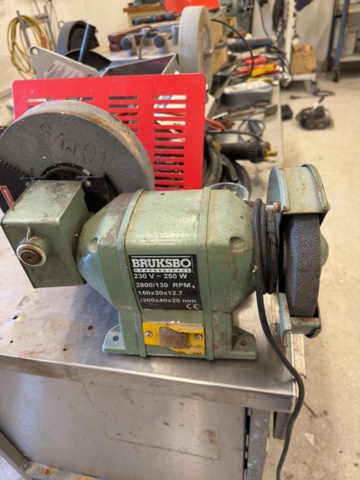 1566890-2 Collection of tools and workshop machines on workbench