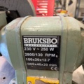 1566890-3 Collection of tools and workshop machines on workbench
