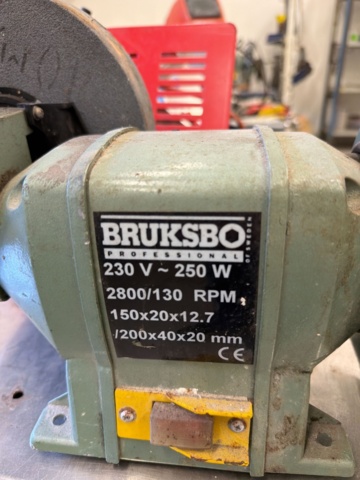 1566890-3 Collection of tools and workshop machines on workbench